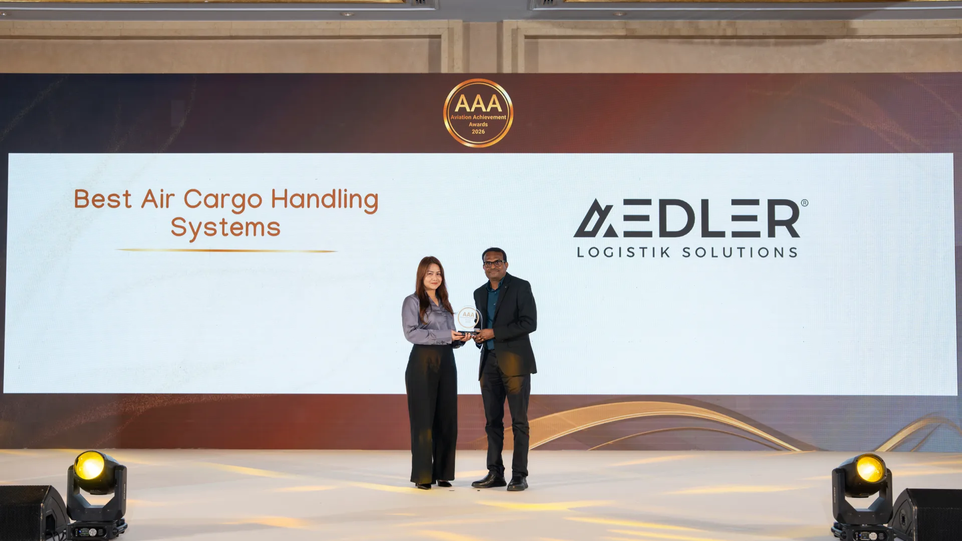 AEDLER representatives with the Best Air Cargo Handling Systems glass award at the Aviation Achievement Awards 2026 in Dubai