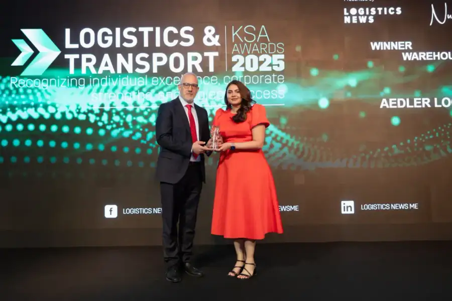 AEDLER representative accepting the Warehouse of the Year trophy at the Logistics & Transport KSA Awards 2025, Riyadh