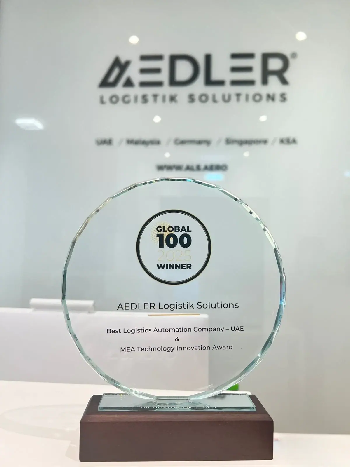 AEDLER’s Global 100 2025 glass trophy for MEA Technology Innovation and Best Logistics Automation Company – UAE