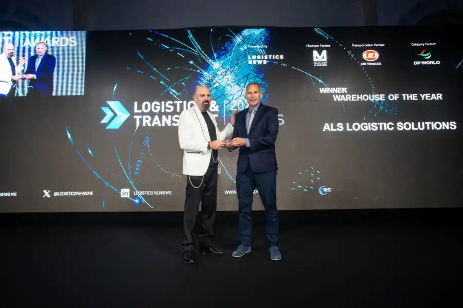 ALS representative receiving the Warehouse of the Year trophy at the Logistics & Transport Awards 2024 in Dubai