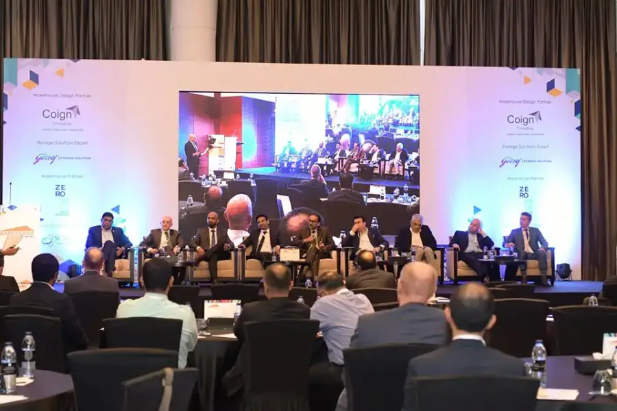 Panelists on stage before a seated audience at the Warehouse MENA Summit 2019, Address Dubai Marina